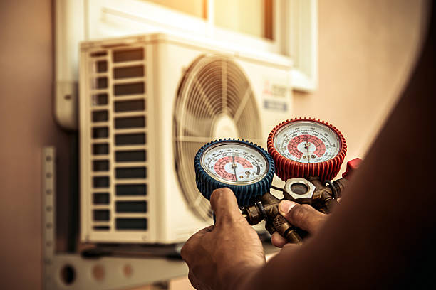 Professional Air Conditioning Service technician working in Lavon, TX